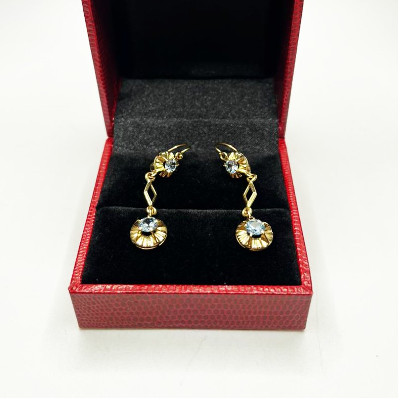 AROS EN ORO 18 KILATES CON AGUA MARINA