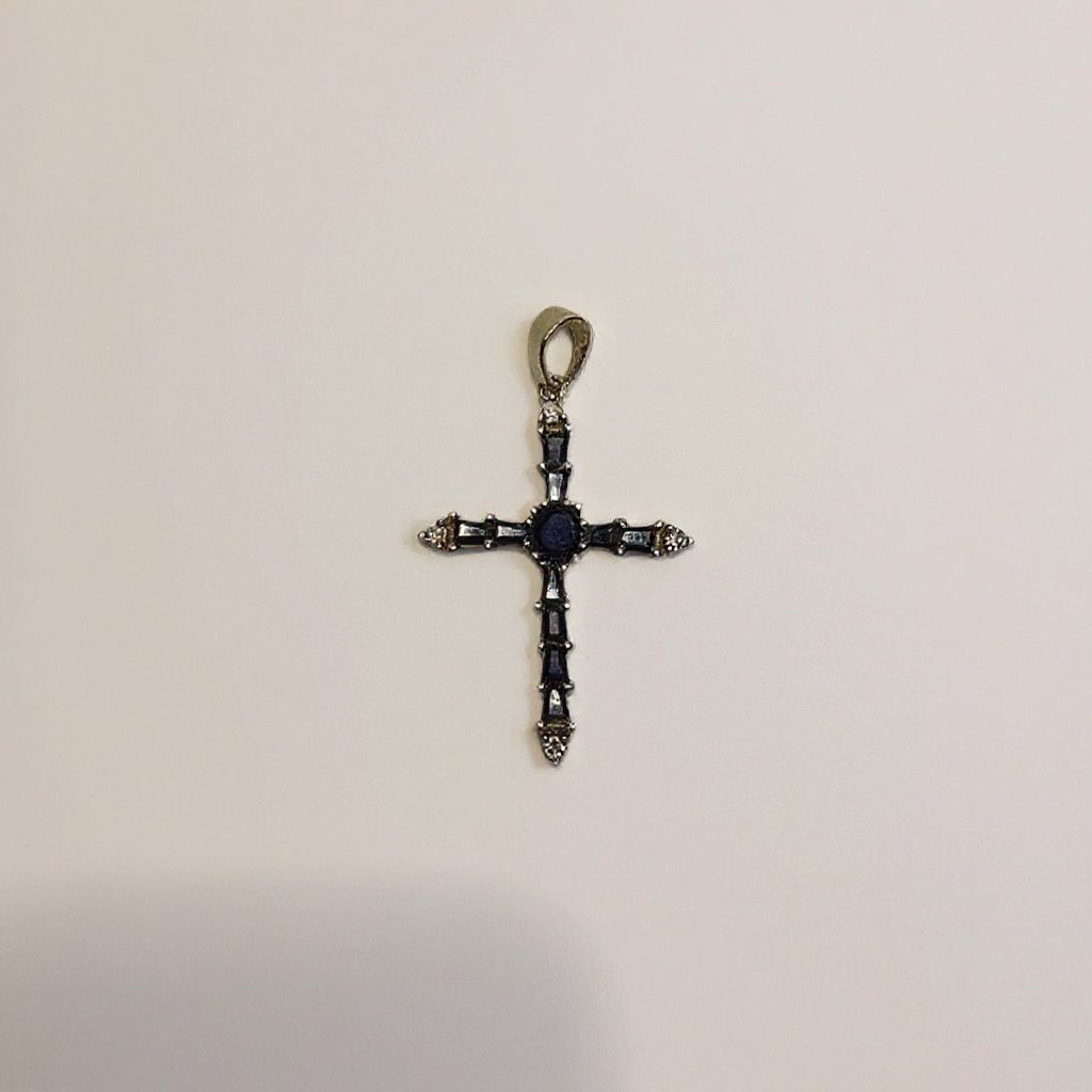 DIJE EN FORMA DE CRUZ EN ORO 18K CON ZAFIROS