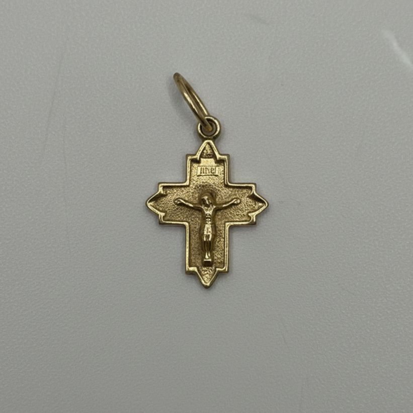 DIJE DE CRUZ EN ORO 18K CON JESÚS CRUCIFICADO
