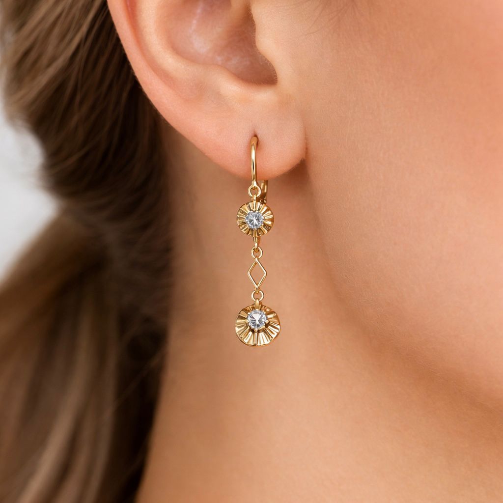 AROS EN ORO 18 KILATES CON AGUA MARINA