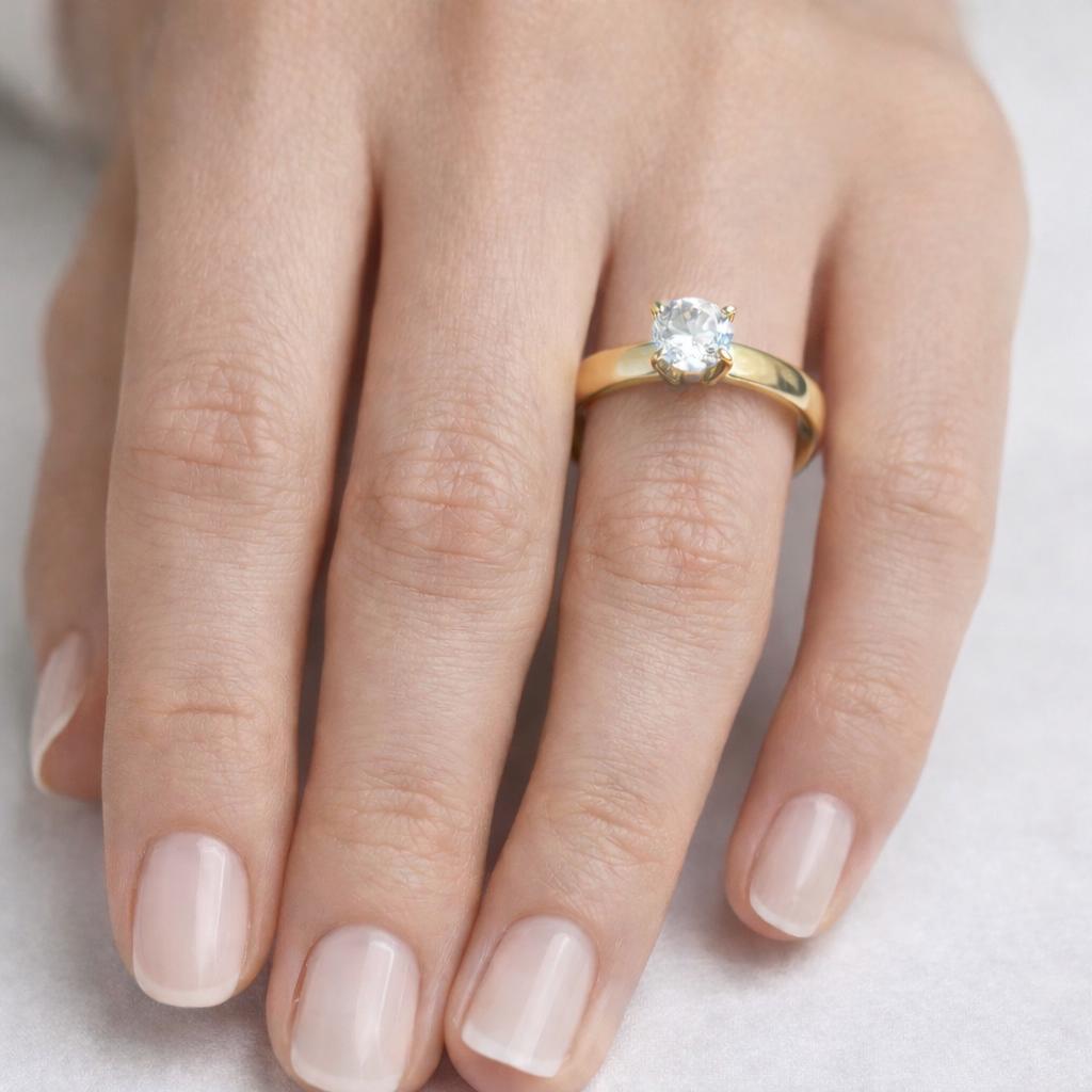 ANILLO SOLITARIO DE ORO 18 KILATES CON CIRCON