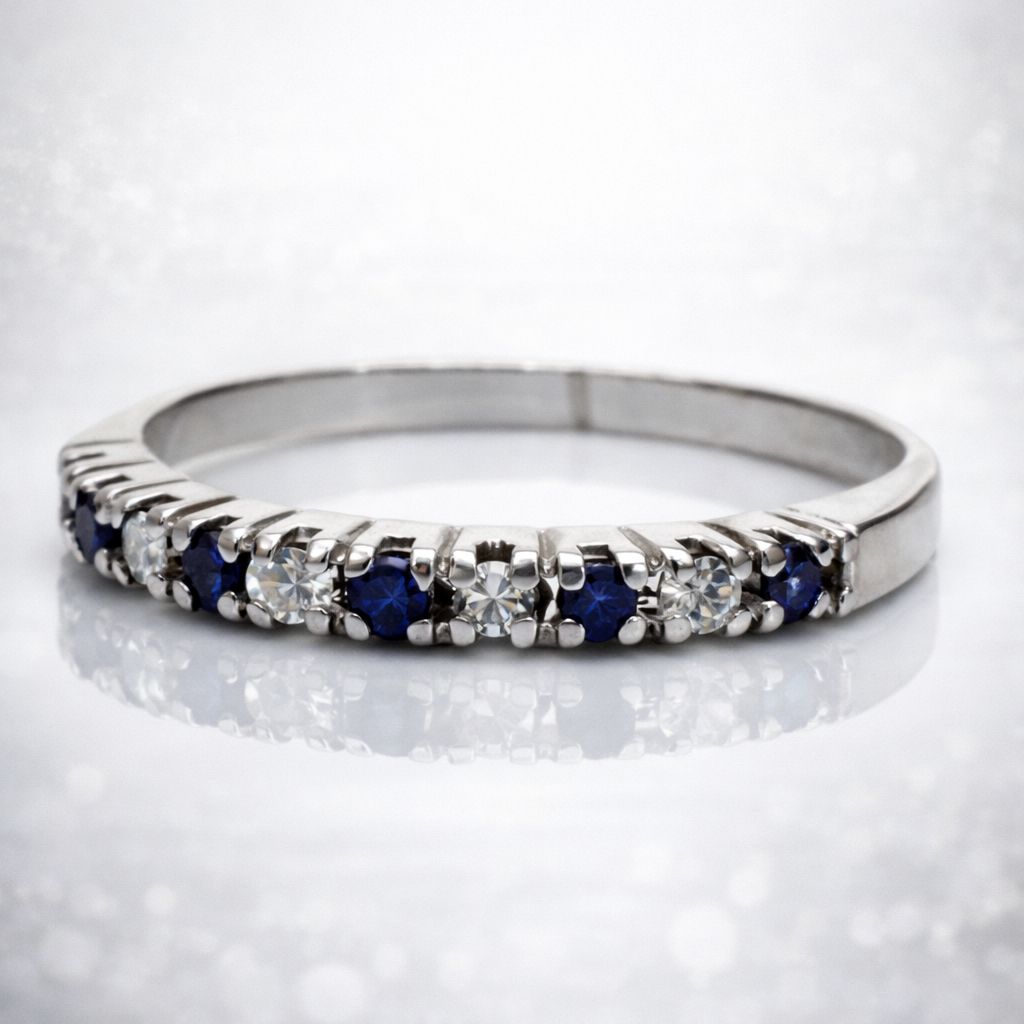 ANILLO MEDIO SIN FIN DE ORO BLANCO 18 KILATES CON ZAFIROS Y BRILLANTES