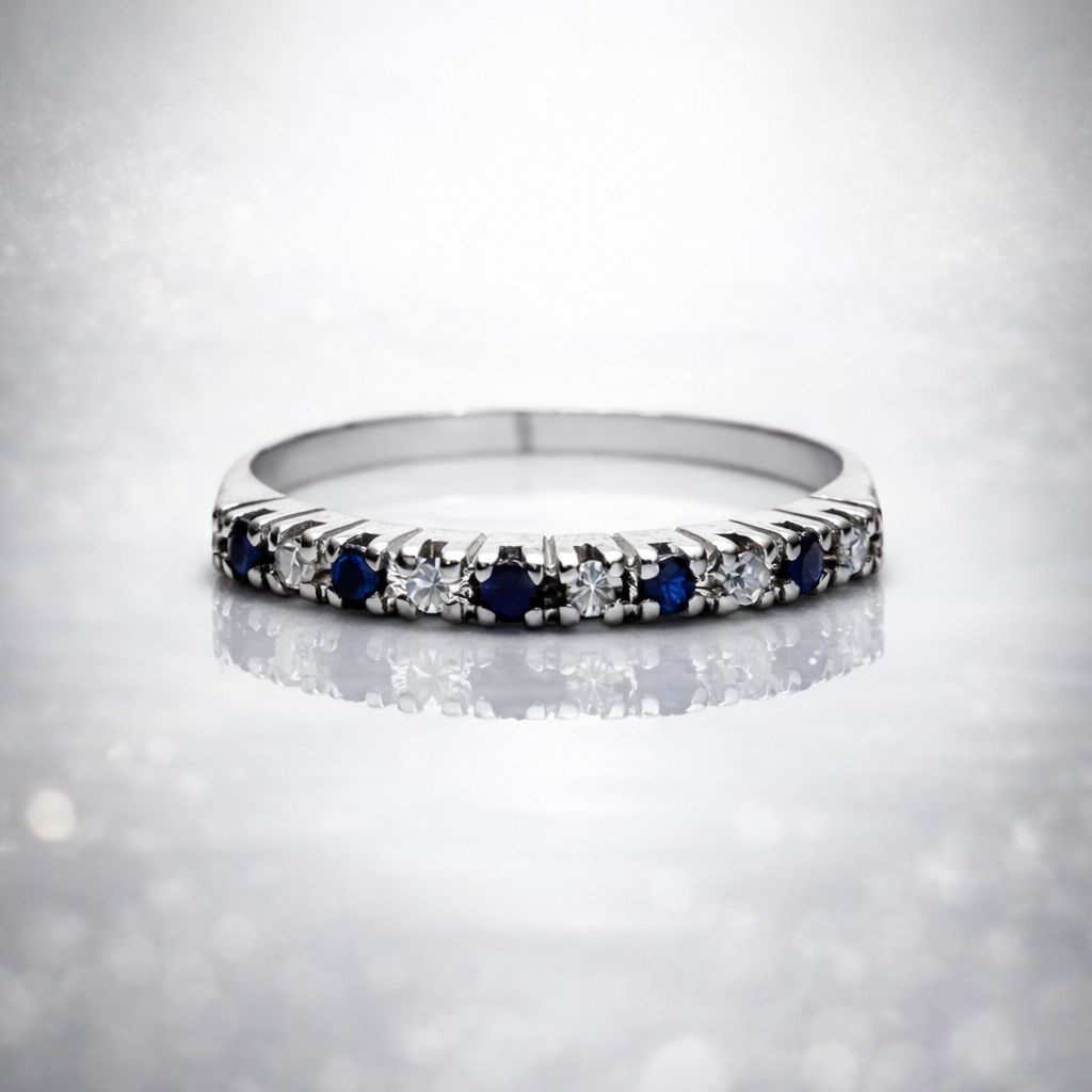 ANILLO MEDIO SIN FIN DE ORO BLANCO 18 KILATES CON ZAFIROS Y BRILLANTES