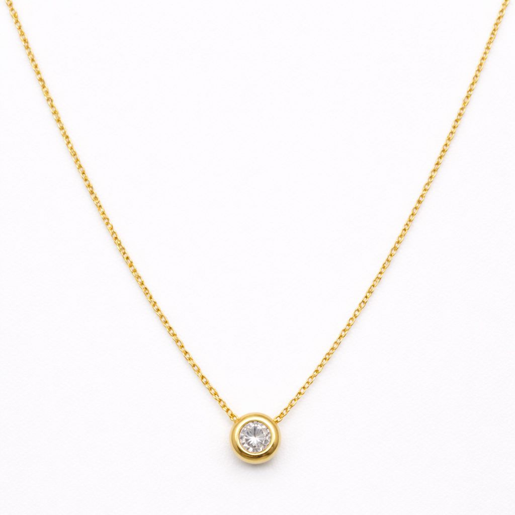 CONJUNTO DE ORO 18 KILATES CON DIJE SUSANITA Y CIRCÓN