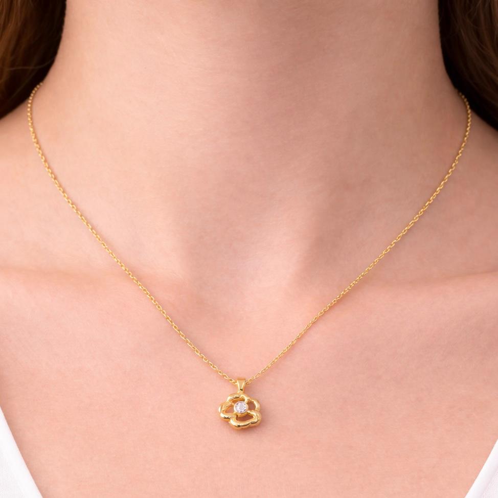 CONJUNTO DE ORO 18 KILATES CON DIJE DE FLOR Y CIRCÓN