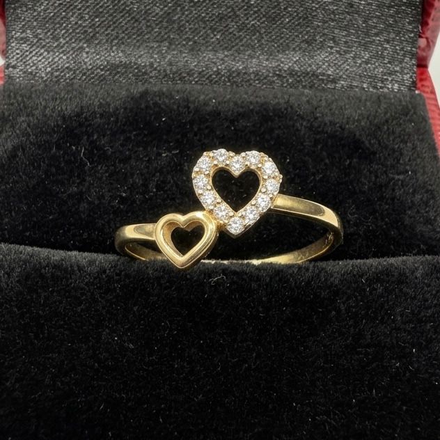ANILLO DE ORO 18 KILATES CON DOBLE CORAZÓN