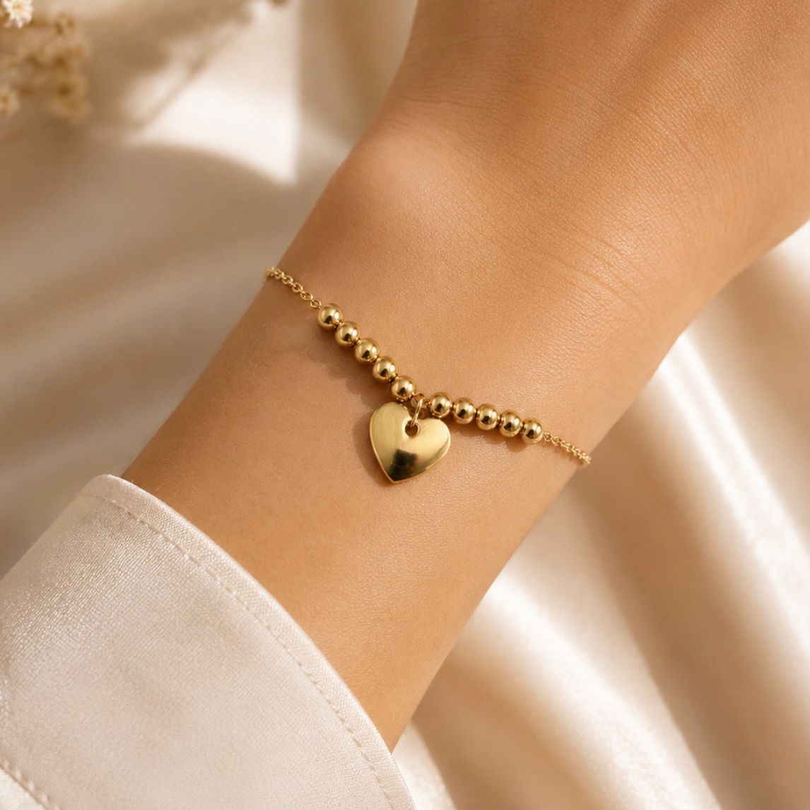 PULSERA DE ORO 18K CON CORAZÓN Y BOLITAS