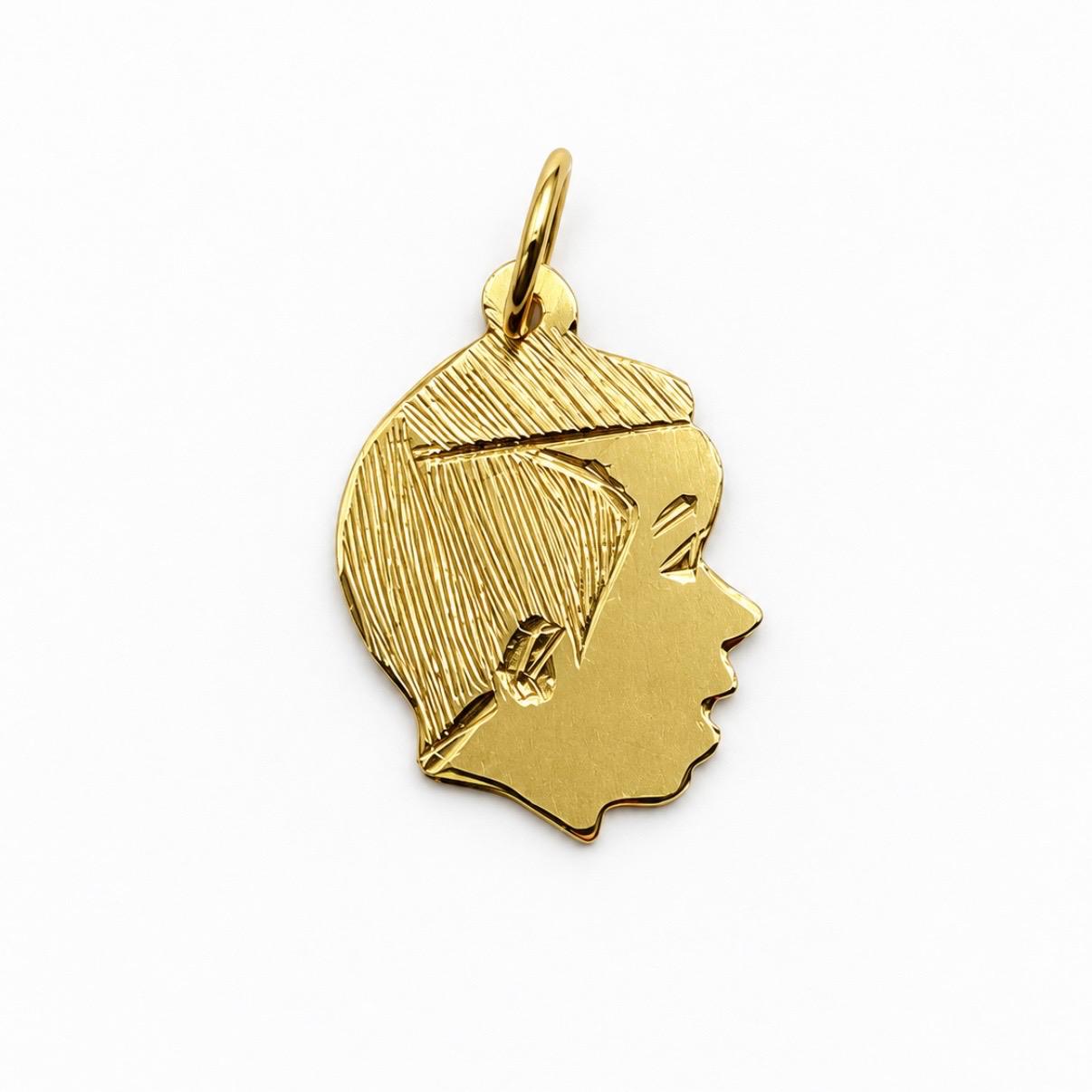 DIJE NIÑO EN ORO 18K