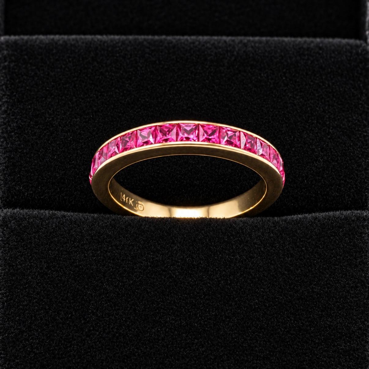 ANILLO MEDIO SIN FIN EN ORO 14K CON 1,60 CT EN RUBÍES