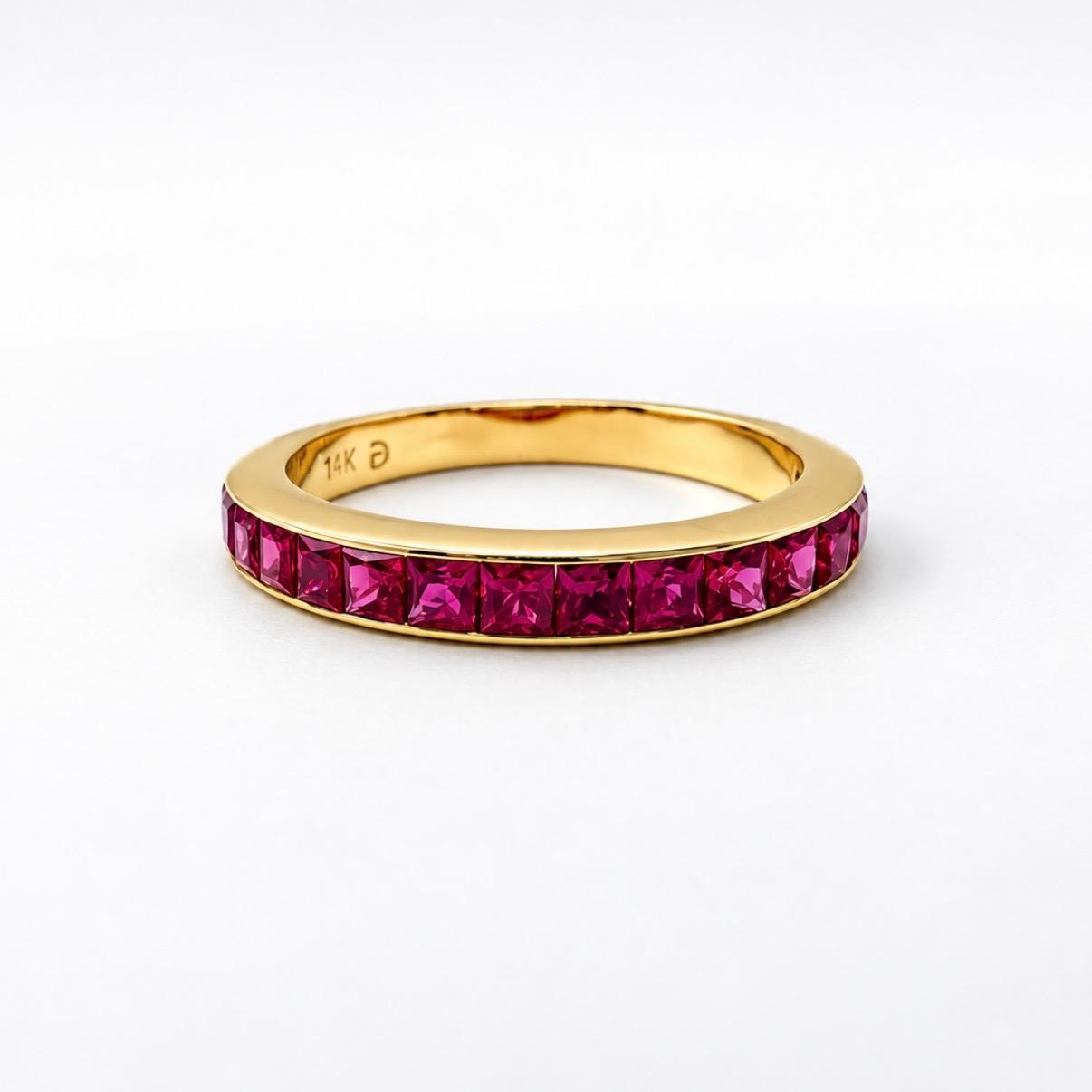 ANILLO MEDIO SIN FIN EN ORO 14K CON 1,60 CT EN RUBÍES