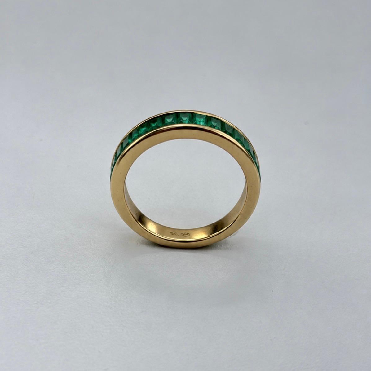 ANILLO MEDIO SIN FIN EN ORO 14K CON 1,50 CT EN ESMERALDAS
