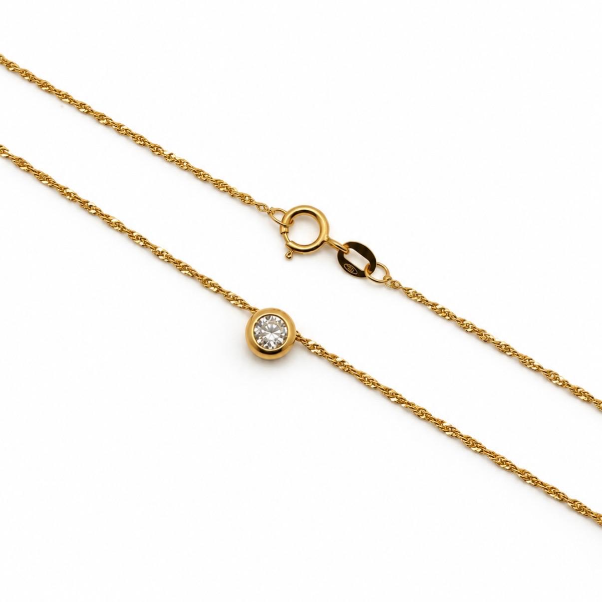 CONJUNTO PUNTO DE LUZ EN ORO 18K