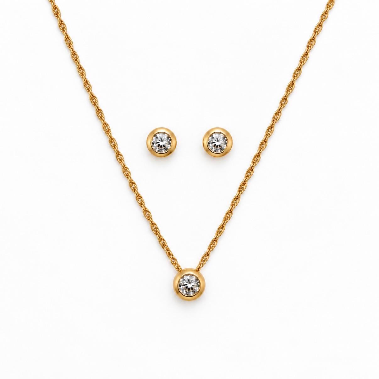 CONJUNTO PUNTO DE LUZ EN ORO 18K