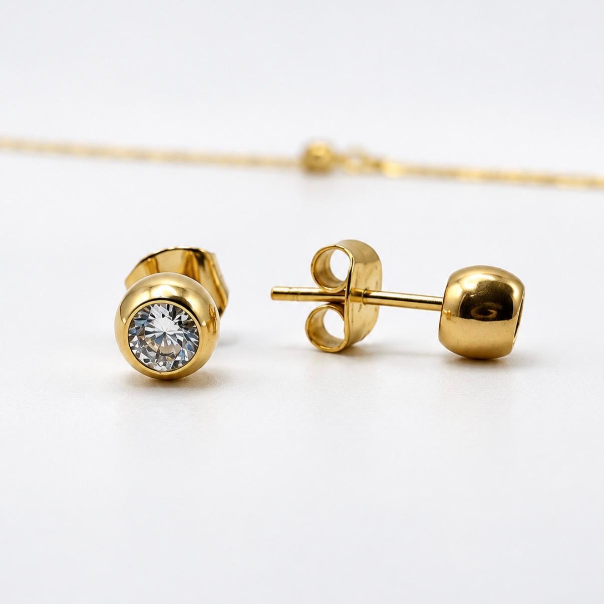 CONJUNTO PUNTO DE LUZ EN ORO 18K