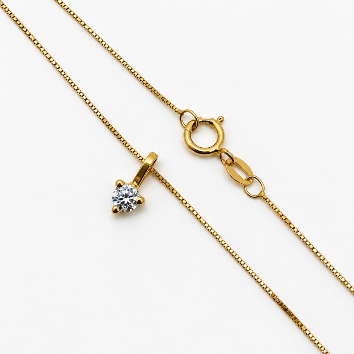 CONJUNTO PUNTO DE LUZ EN ORO 18K