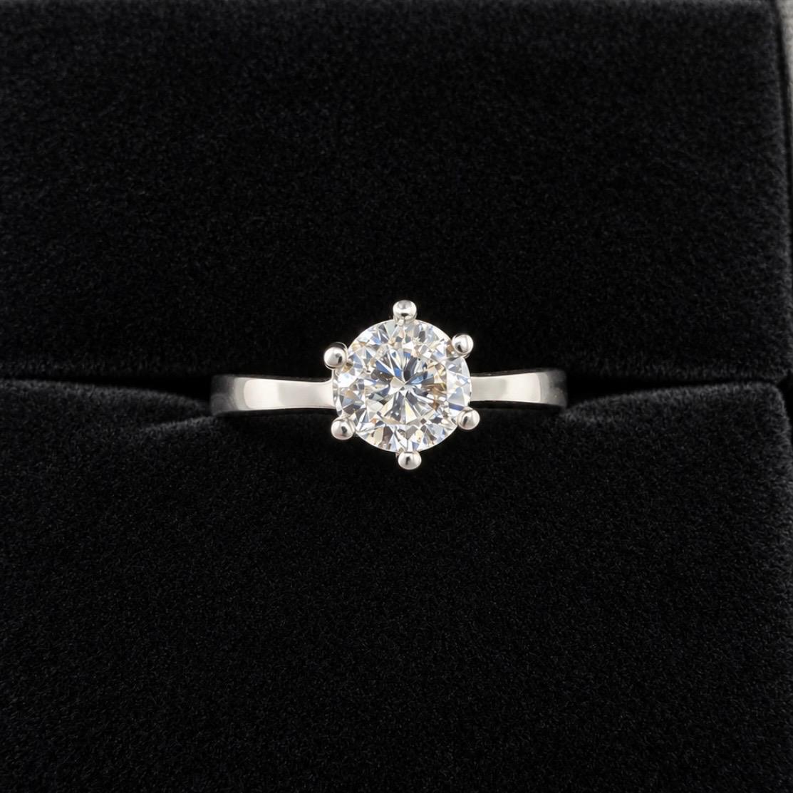ANILLO SOLITARIO EN ORO BLANCO 18K CON BRILLANTE NATURAL
