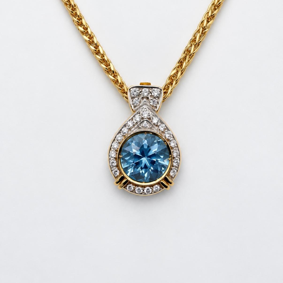DIJE EN ORO 18K CON AGUAMARINA DE 5 CT Y BRILLANTES NATURALES