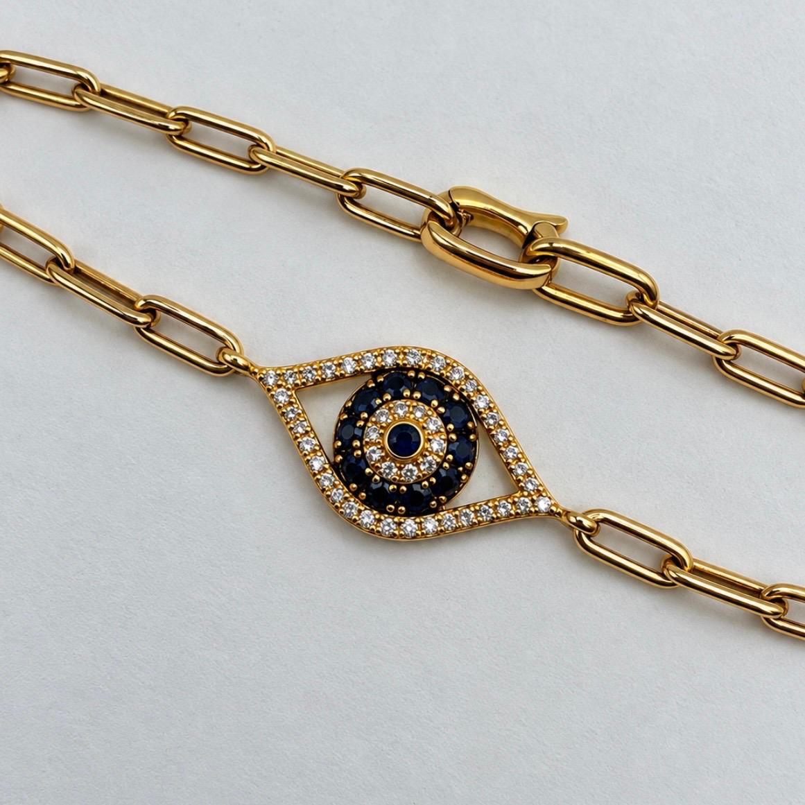 PULSERA OJO PROTECTOR EN ORO 14K CON ZAFIROS Y BRILLANTES