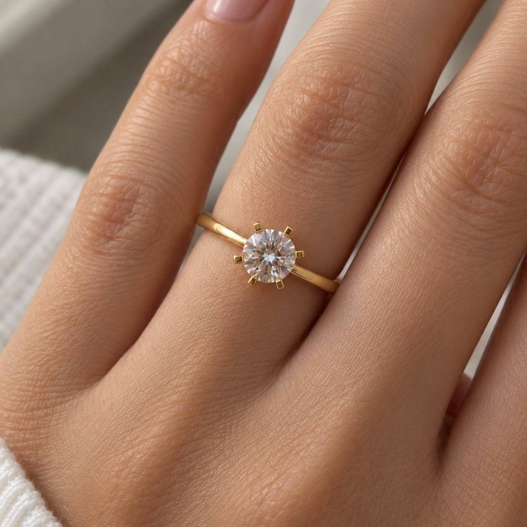 Anillo solitario en oro 18K con circón