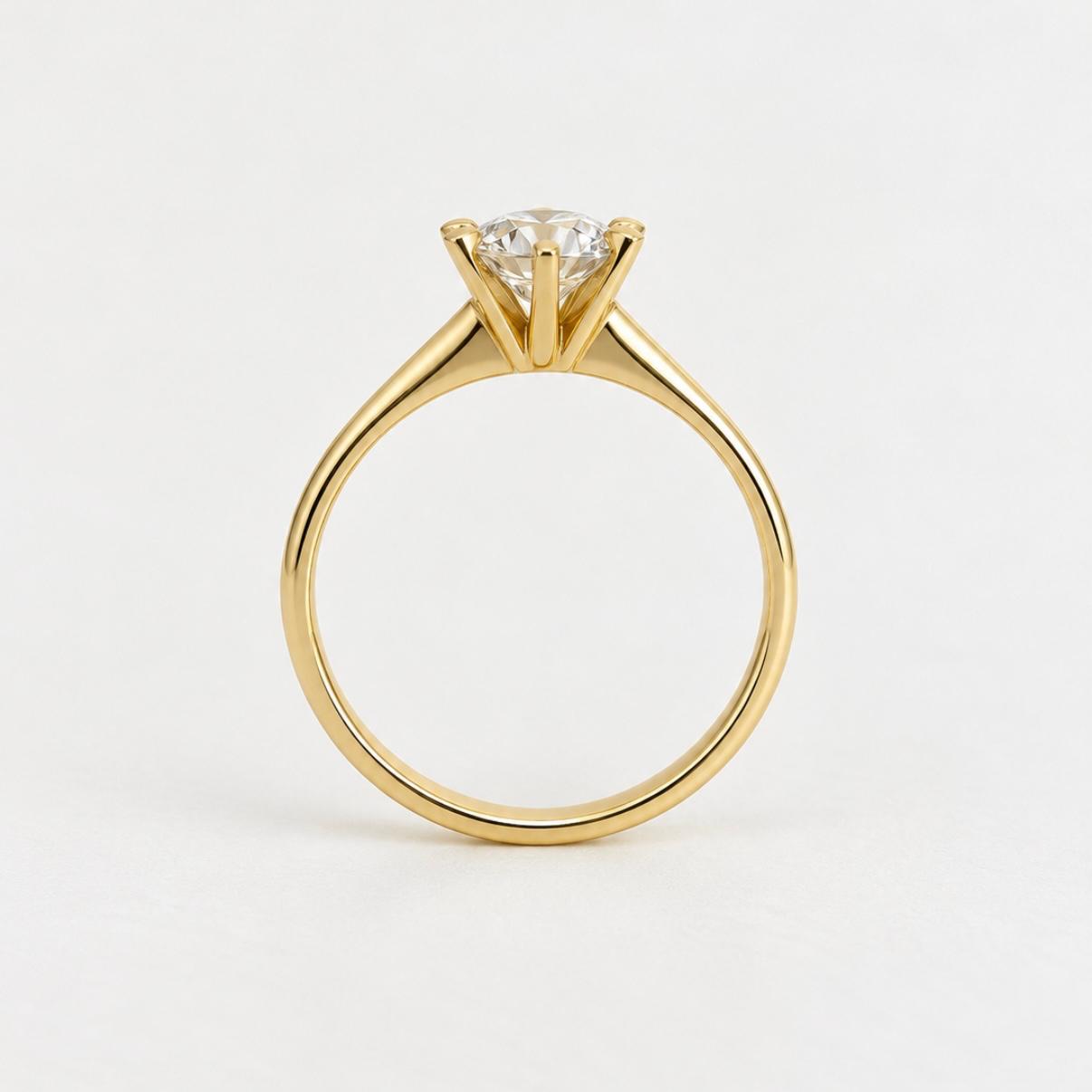 Anillo solitario en oro 18K con circón